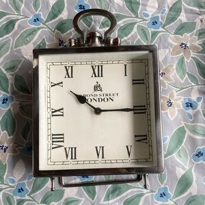 49 bond street London silver desk clock!